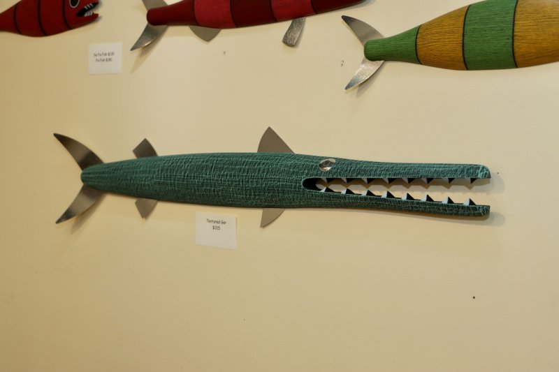 Owner Sandy Phalen said this textured green gar is one of her favorite pieces that she is taking home.